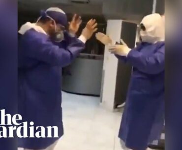 Coronavirus: doctors and nurses in Iran filmed dancing in bid to boost morale